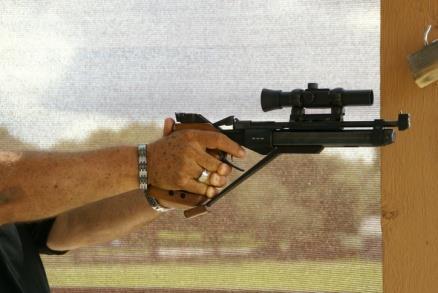 Offhand Pistol Shooting Position: Means holding and shooting a pistol while standing without any support other than an arm or arms fully extended.