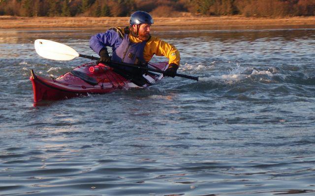 ** Gear list - sea kayak with 2-3 bulkheads, waterproof compartments, deck lines, & surf toggles; dry suit, PFD, skirt, paddle, helmet, helmet liner, gloves, extra clothing in dry bags, warm