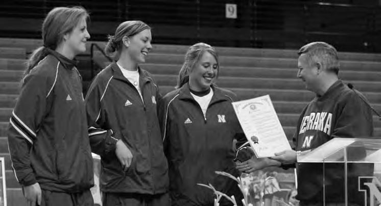 HISTORY Husker captains Tracy Stalls, Christina Houghtelling and Dani Busboom receive a proclamation from
