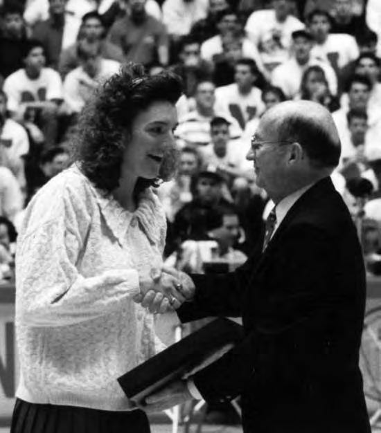 HISTORY Janet Kruse receives her NCAA Top Eight Award in 1992. Kruse is one of four Husker volleyball players who have been NCAA Top Eight Award winners.