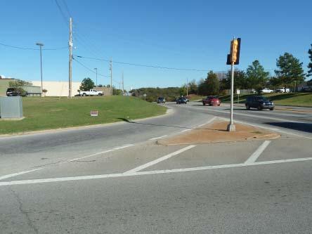 An existing shared use path has built on the north side of West 41st St, but ends before the intersection of Hwy 97.