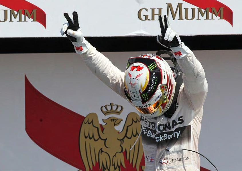 A fast lap and a perfectly timed switch to intermediate tyres saw Lewis Hamilton come