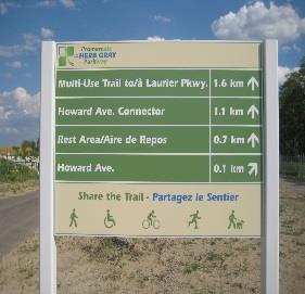 Figure 8 - Samples of Signage Types; (left) Veloroute Voyageur Cycling Route logo; (middle) Welland Canals Trail; (right) Fort Creek Conservation Trail.