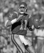 In 2002, he completed 309-of- 489 passes (63.2%) for 3,942 yards and 33 TDs, all USC records. He threw for 300-plus yards in a USC-record 7 games that season, including 3 in a row.