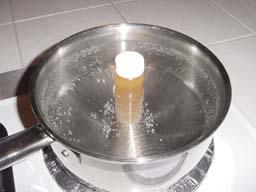 METHOD #1 STEP 5 Now, put it in a pan of cold water (tap water). Put it on the stove and heat it up. When it gets to almost boiling, turn off the stove.
