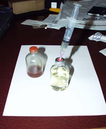 METHOD #2 STEP 5 Now I am taking 2cc's out of the "oil vial" with