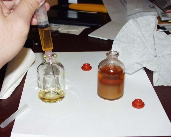After getting a full syringe, I transferred the clear tren into the oil bottle directly.