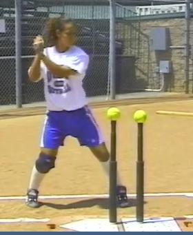 DRILL #15 DOUBLE T DRILL 23 Emphasizes proper contact point and that the batter hits through the ball. Set two tees up together. 1. Batter steps into batter s box and takes her normal swing.