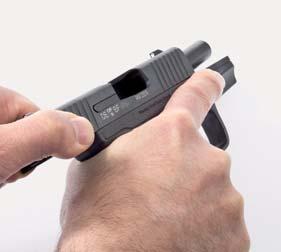 Depress the magazine release and remove the magazine (4.5 Fig. 1). Keep the muzzle pointed in a safe direction, and keep your finger off the trigger and outside the trigger guard.