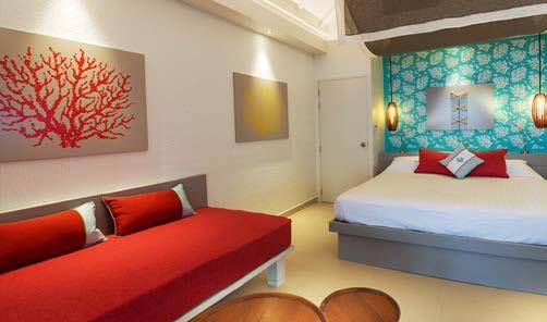 DELUXE ROOM WITH TERRACE - Size: 74 sqm (indoor: 54 sqm) - Maximum occupancy: 2 adults - Sea view GARDEN CLUB ROOM - Size: 32 sqm - Maximum occupancy: 3 (2 adults + 1 child under 12 years old) -