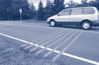 Neighbourhood Traffic Management Guide Appendices RUMBLE STRIPS Description: Raised buttons, bars or grooves closely spaced at regular intervals which create both noise and vibration in a moving