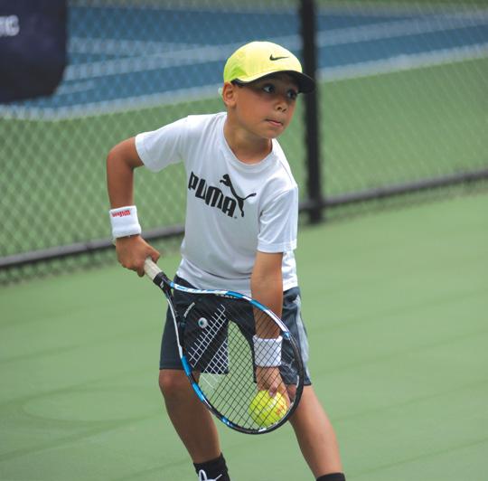 TENNIS MUNCHKINS TENNIS This exciting new play format for learning tennis is designed to bring kids into the game by utilizing specialized equipment, shorter court dimensions and modified scoring all