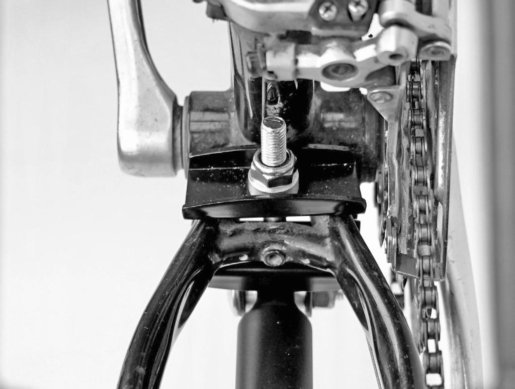 As you tighten, check two things: That the square head of the carriage bolt is fully seated in the square hole on the extension tube bracket That the chainstay clamping