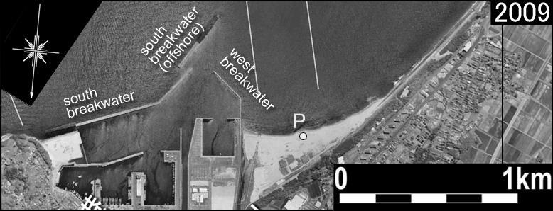 1 Aerial photograph around Ohtsu fishing port in northern Ibaraki Prefecture and calculation domain. detached breakwaters because of the erosion.