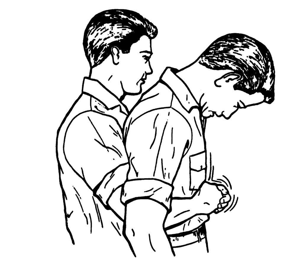 (d) Thrust into the casualty's abdominal region (figure 5-3) using a quick inward and upward motion, then relax the hold. Figure 5-3. Administering an abdominal thrust to a standing casuallty.