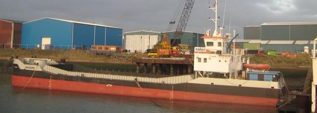 This self-propelled, spudstabilised cranebarge, equipped with a 150 tons Amclyde crane, is used for dredging