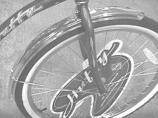 Front Wheel NOTE: If the bicycle does not have a front fender, go to Step 2. Step 1: If the bicycle has a front fender, attach it to the fork as shown.