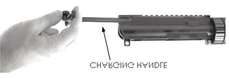 22 & 23) then pull the charging handle while lifting to remove it (Fig. 24).