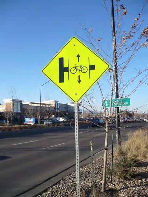Suburban Intersections Pedestrian and Bicyclist Safety Treatment 2: Include Bike Lanes and Signage Alerts bicyclists that