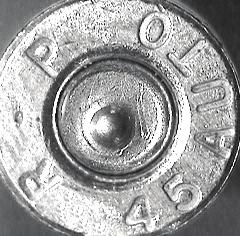 The magnified Headstamp of the evidence cartridge case is