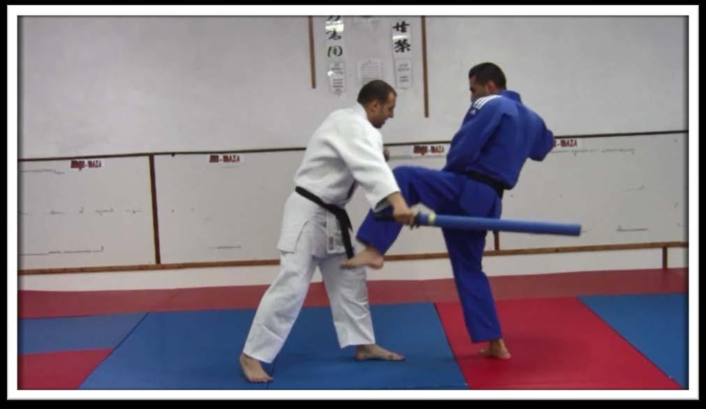 How to Defend against a Stick attack from below In this situation the first thing you must do is block the strike by rising your left leg up towards his forearm.