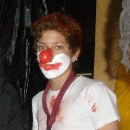 red-nosed & red-headed clown, while cute Aaron E.
