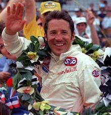 Even though he s long-retired from racing, every few weeks Mario Andretti takes the wheel at racetracks around the country, as part of the Indy Racing Experience.