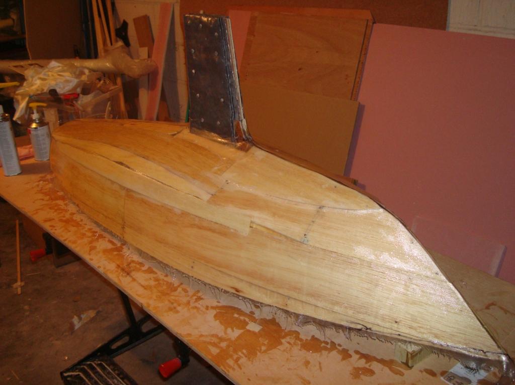 Fibreglass The boat required being more solid than having balsa wood sides and thus I decided to cover with fibreglass.