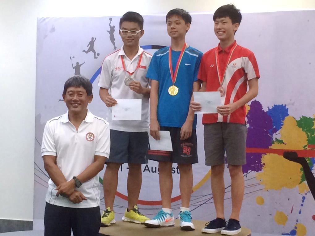 Abdul Rahman (second from right) and Ong Yong Qing (right) won the Men's Youth 17 10m Air Rifle