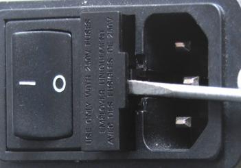 Insert a small flat blade screwdriver under the lip on the right side of the fuse housing cover (Fig. 9). Fig.