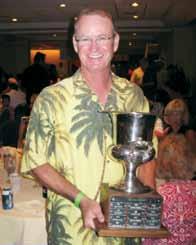 Representing the Palm Beach GCSA team, Mark Henderson from the Gulfstream GC accepted the Poa Classic Chapter Team trophy. Photo by Joel Jackson.