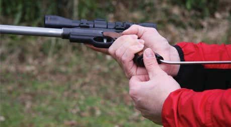 The other hand should then be used to insert the magazine into the action before bringing