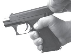 hand. 5. SLIDE CATCH LEVER The P7 pistols incorporate a slide catch lever located on the left side of the frame behind the trigger.