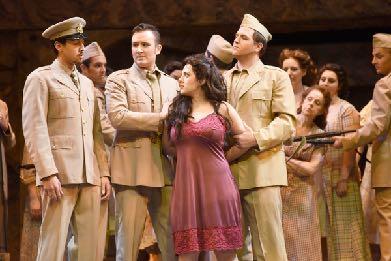 FINE ARTS (Music) This opera s setting is Seville around 1820. In it, a soldier falls in love at first sight with a gypsy cigarette girl, and he deserts the army to pursue her.
