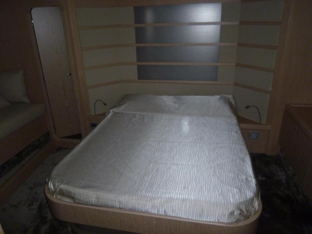 Beds, mattresses, bedspreads, carpets, etc.