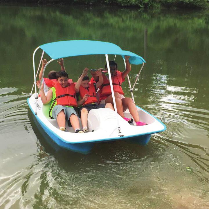 Campers enjoy swimming, canoeing, paddle boating, hiking, archery, organized games, fitness, arts & crafts, devotions, camp songs, and the occassional field trip.