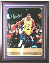 S7 - Elgin Baylor Memorabilia Autographed Elgin Baylor uniform with photos, Lakers pins and Hall of Fame 1977 plaque. Framed 33 ½ x 42.