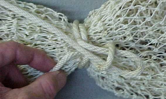 insert a slippery overhand knot (1).