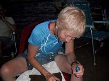 Judi, painting 160 toe nails to celebrate life after Lava.