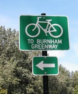 Standard turn arrow signs (M5 and M6 series) may also be used in conjunction with bike route signs to clarify turn movements.