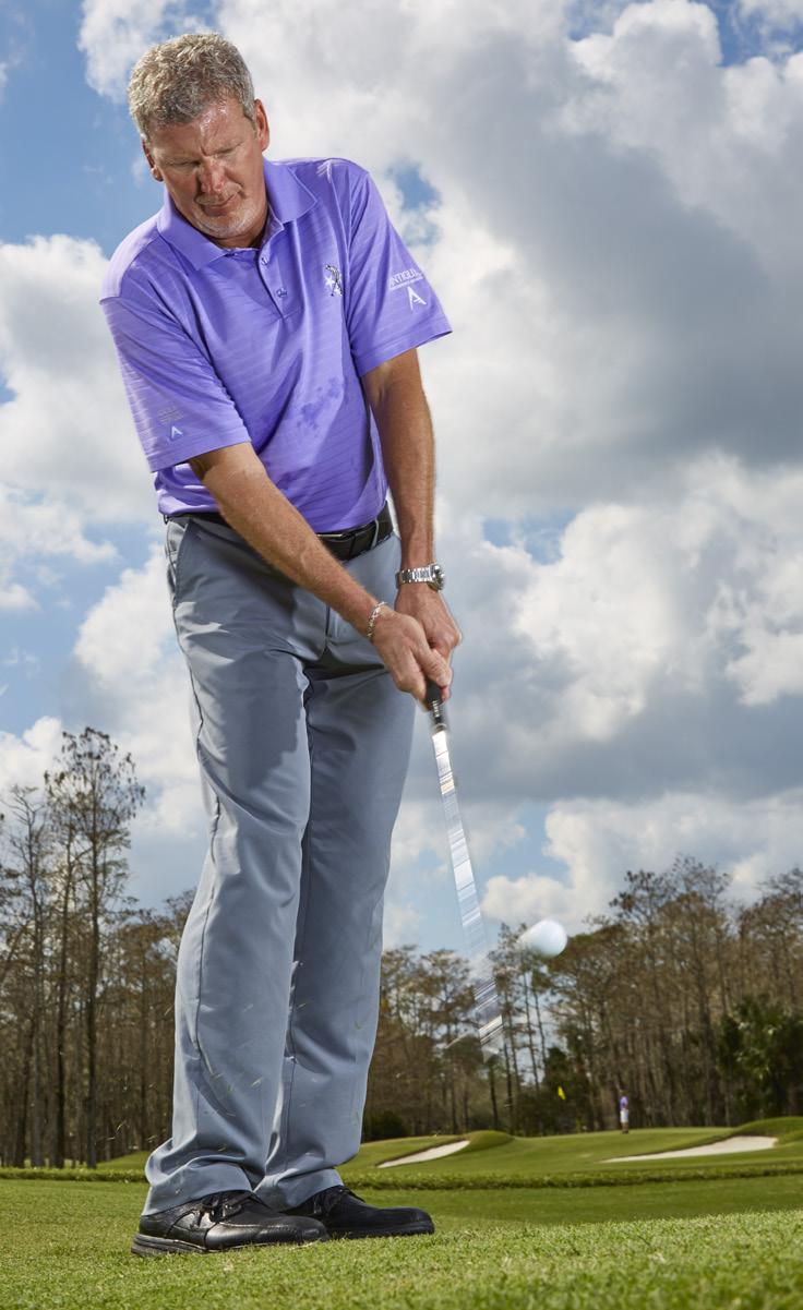 STEP 7 Push the club down and forward with your right arm, allowing your body to turn in