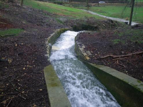 At present, the feeder stream running into the lake has been placed in a long culvert.