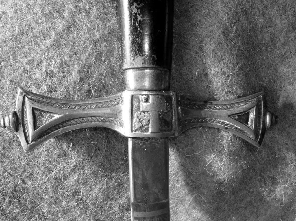 THE MOST ILLUSTRIOUS ORDER OF ST. PATRICK A donation last Spring, by Father George McCarthy, of a beautifully engraved ceremonial sword and scabbard originating from the Knights of St.