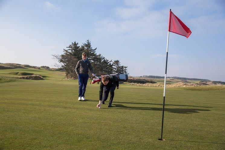 Ross must re-drop the ball with no additional penalty. B. Ross incurs an additional one-stroke penalty and must place the ball at the point where the ball first struck the course when dropped. C.