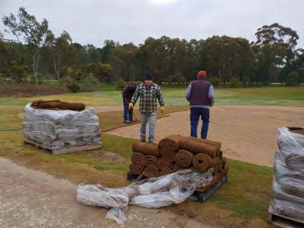 Glenn and a good number of volunteers who re-laid the practice green and