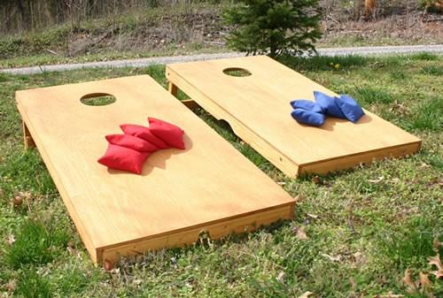 Corn Hole Already have corn hole at home? Bring it to the carnival and give each kids 3 tosses.