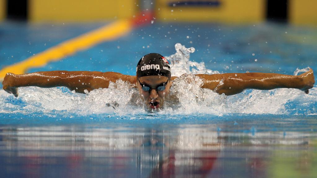 Marwan Naamani/AFP/Getty Images Image above: Oussama Mellouli during the 400m individual medley at the 2011 Pan Arab Games in Doha.