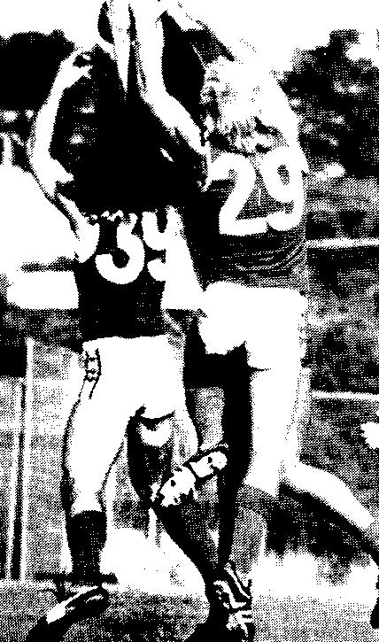 Chris Ashton 29 and Glenn Kendall ( 39) in action against Karingal in 1988.