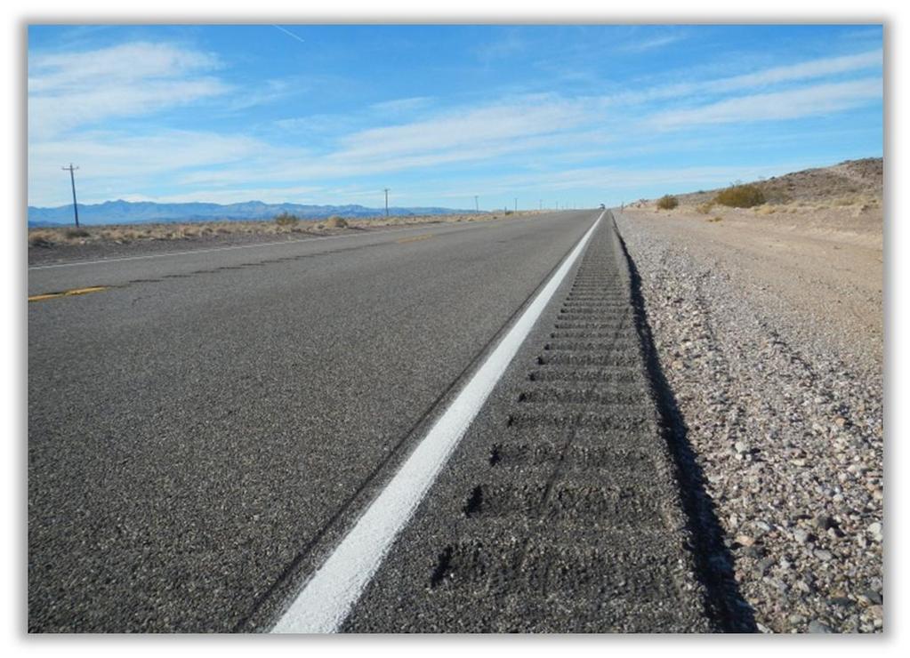 US 95, South of Goldfield: Rumble strips placed within a narrow shoulder make the shoulder unusable for