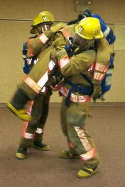 November 2006 Page 19 of 19 Victim Removal - continued One rescuer stands or kneels over the victim (locking the victim s knees) and pulls then to a standing position.